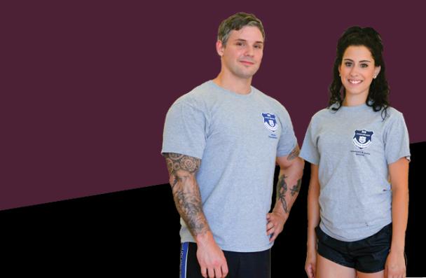 Two people dressed in gym clothes