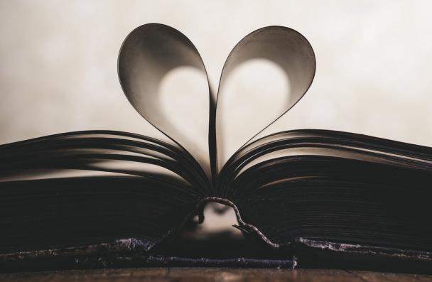 book open with middle pages in the shape of heart