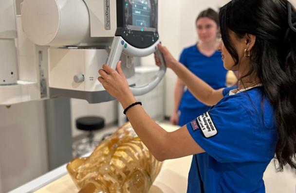 Mohawk students working in a training lab.