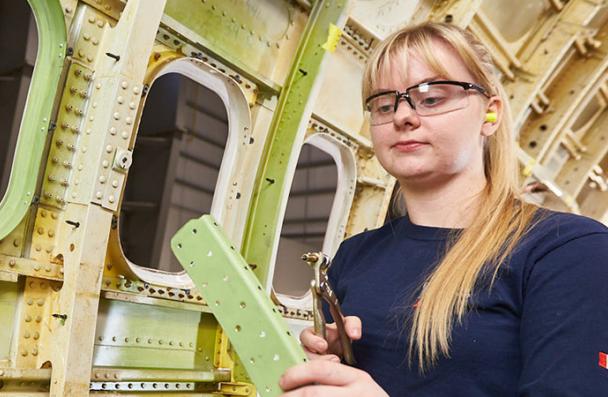 Ashley working on an aircraft