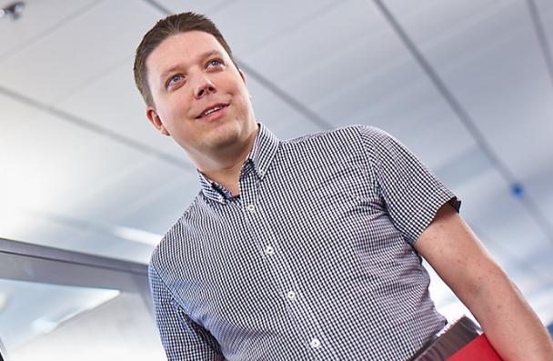 Mike Allen working in the permit office of City of Hamilton