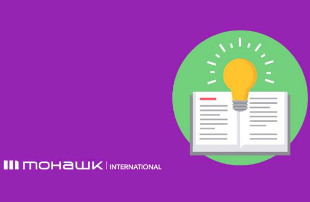 Icon of an open book with a lightbulb inside and the Mohawk International logo