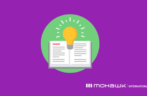 Banner with a purple background and an icon of an open book with a lightbulb above.  