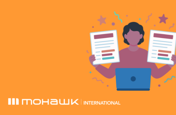 icon of a person in front of a laptop holding a page on each hand and the Mohawk International logo at the bottom