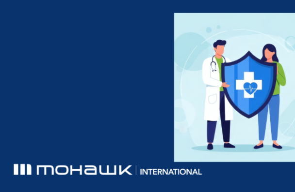 Two people holding a health symbol and Mohawk International logo