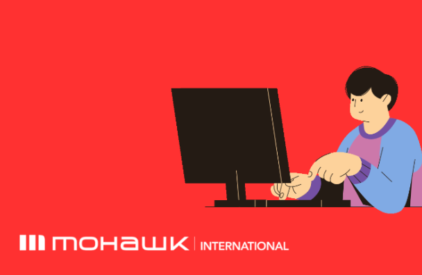 The Mohawk International logo at the left bottom corner and an icon of a person using a desktop on the right
