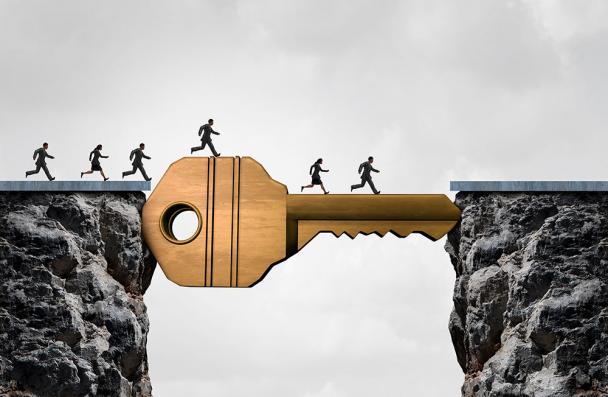 People running across a bridge that looks like a key.