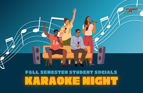 four students singing with microphones, sitting on a couch in between speakers