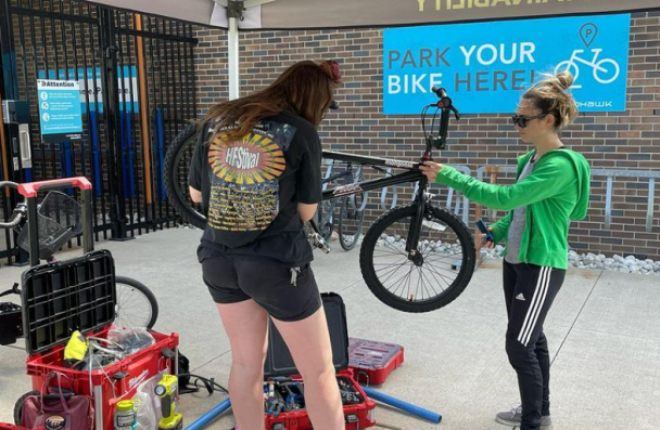 Bike tune ups happening outside of Secure Bike Cage 