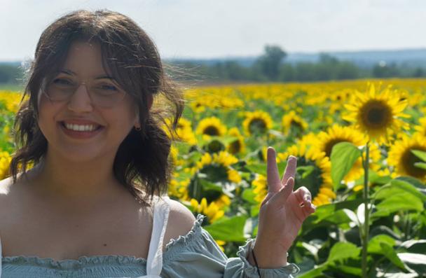 Jovana in a sunflower field
