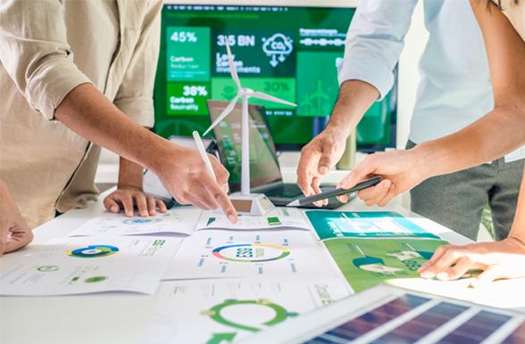 Students examining engineering plans