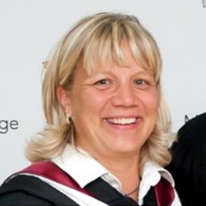 Headshot photo of Shelley Lang